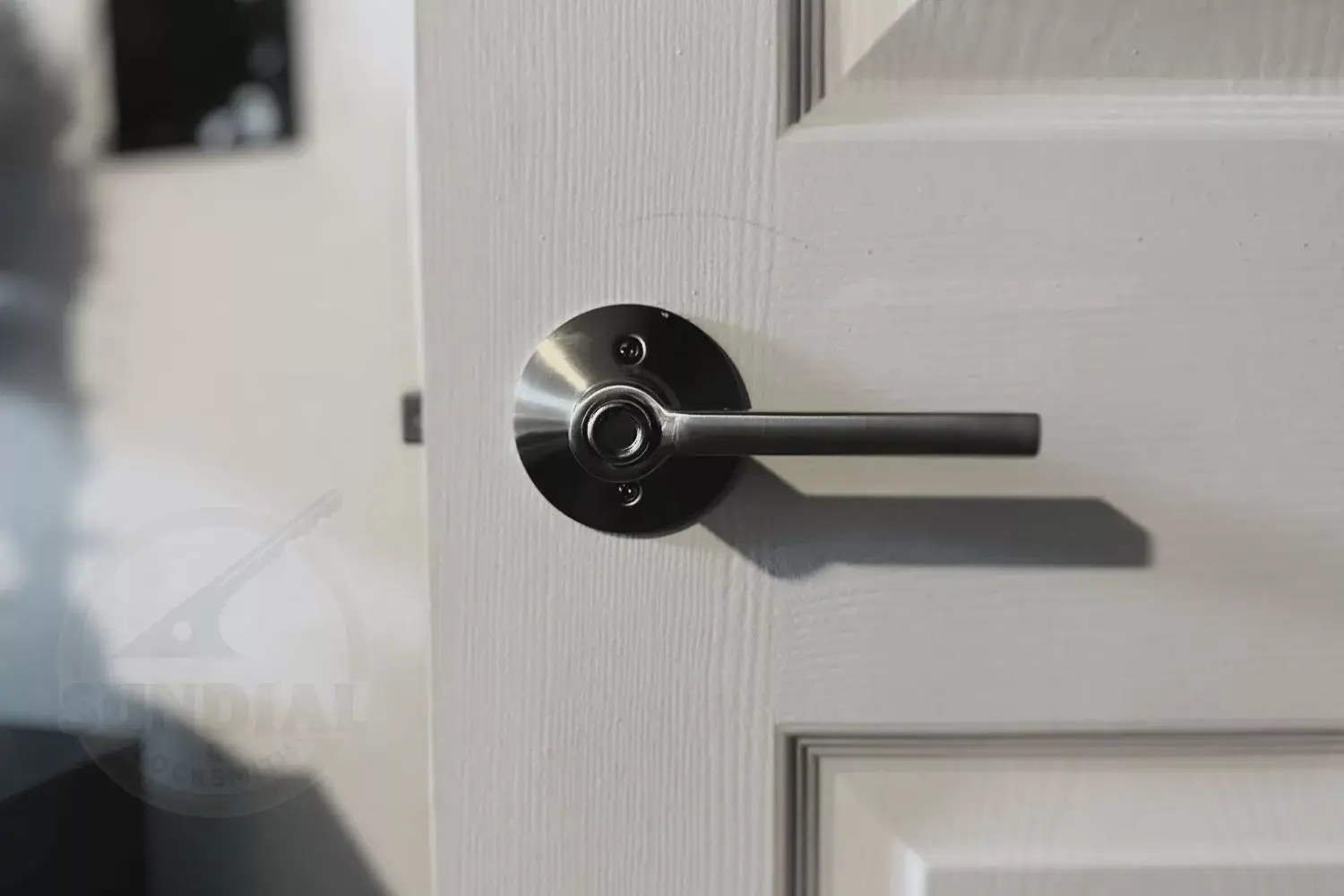 New bedroom door lock being installed.