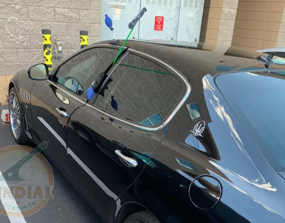 Locksmith aiding a car owner with a lockout