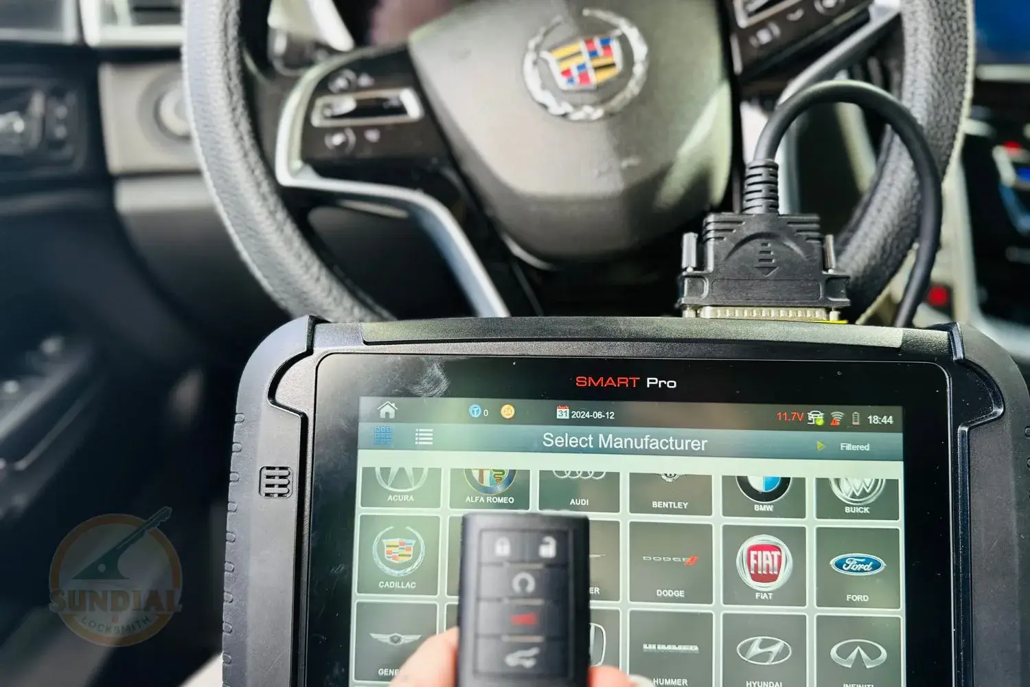 Car diagnostic tool displaying vehicle manufacturer options.