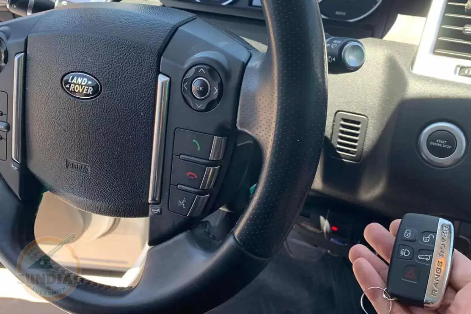 Land Rover steering wheel and car key fob.