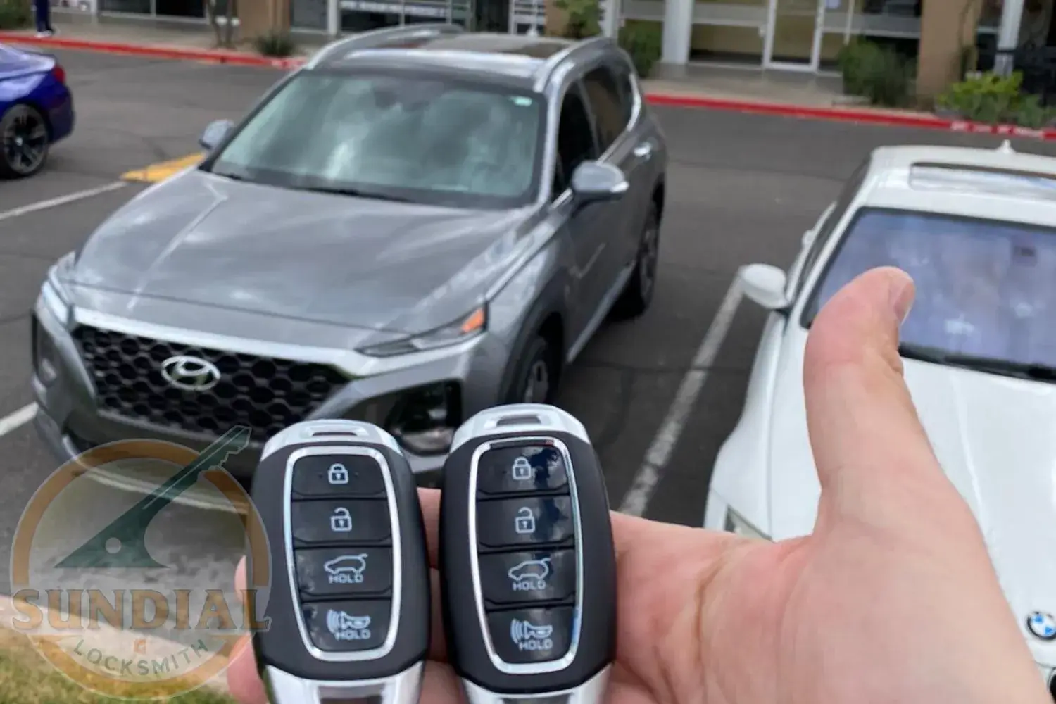 A sleek, modern car key on the store background.