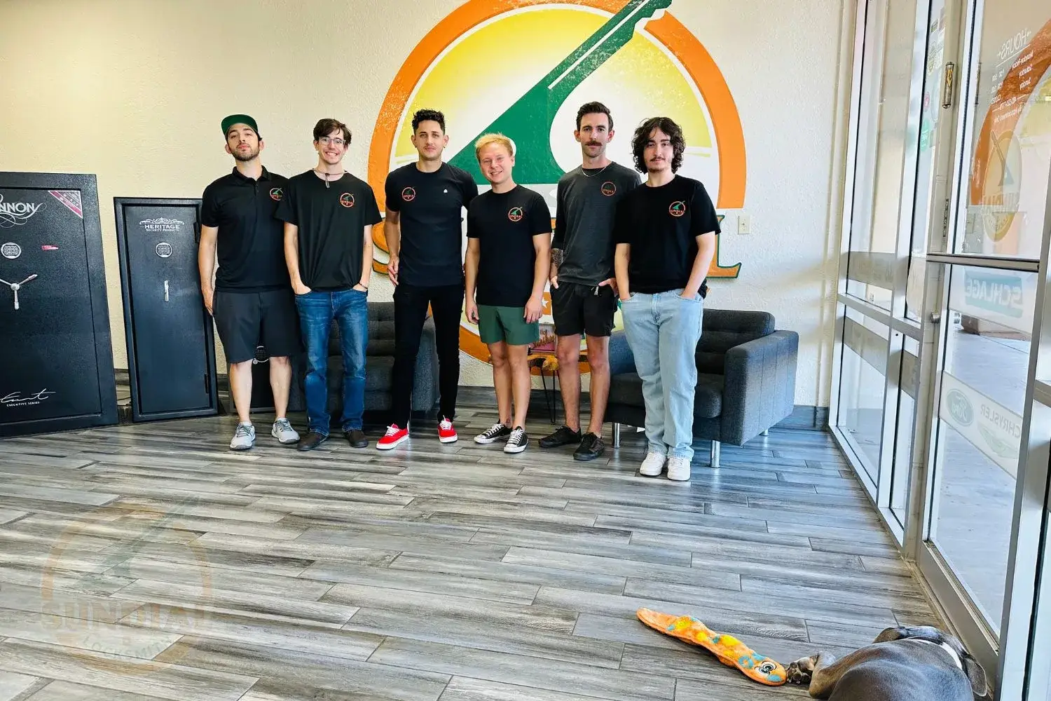 Sundial Locksmith Technicians in Front of Store Logo